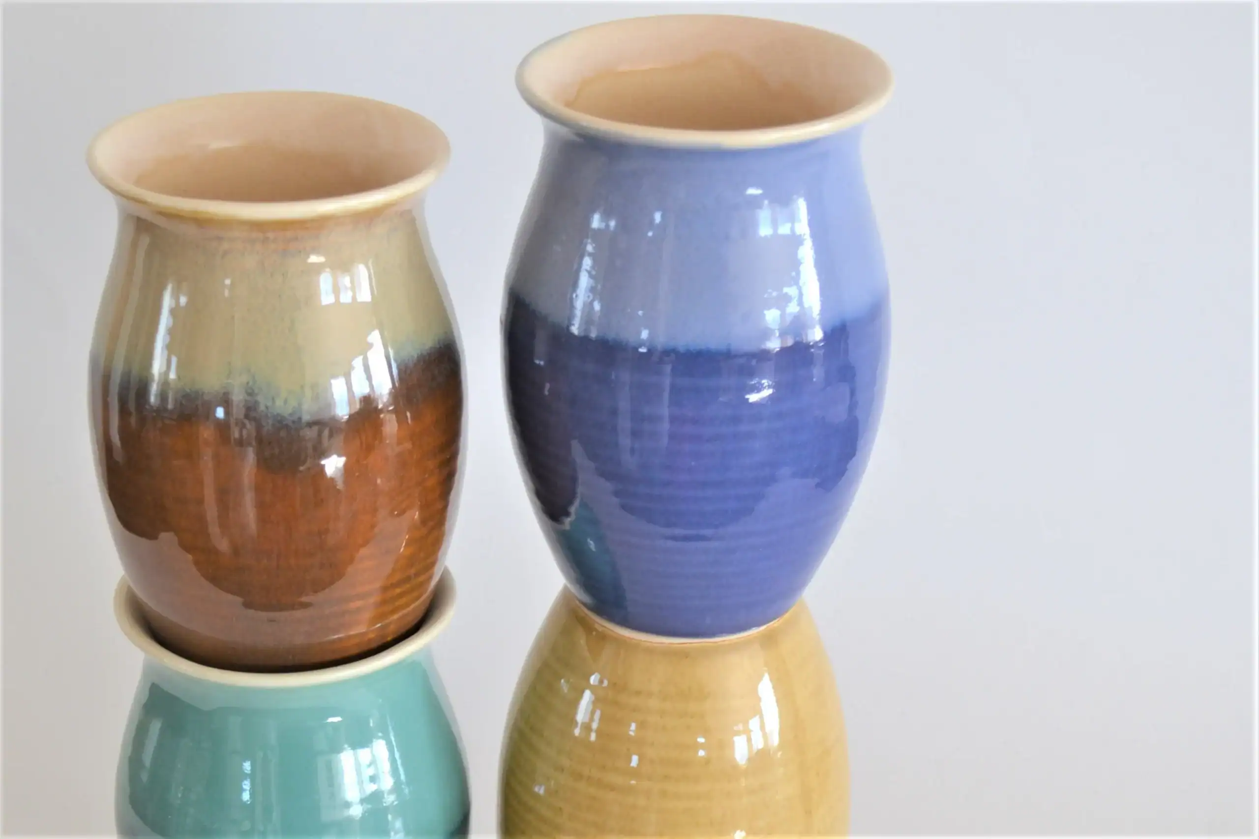 group of 4 multicolored jarritos mugs