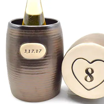 engraves wine chiller with wine bottle inside it
